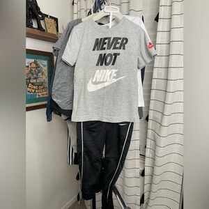 Boys Nike black, grey and white pant set.